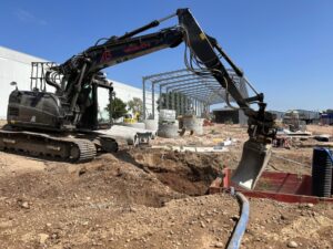Blog 10 Takeuchi excavating warehouse foundation
